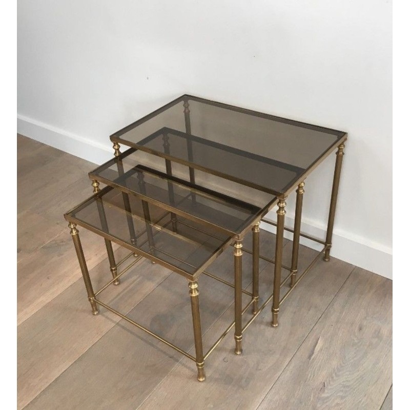 Set of Three Neoclassical Gilt Brass & Smoked Glass Nesting Tables, France circa 1940