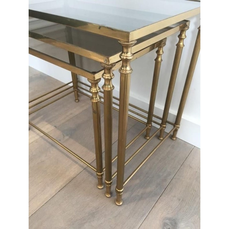 Set of Three Neoclassical Gilt Brass & Smoked Glass Nesting Tables, France circa 1940
