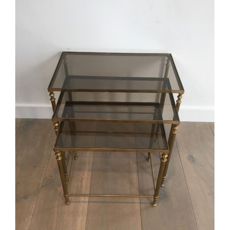 Set of Three Neoclassical Gilt Brass & Smoked Glass Nesting Tables, France circa 1940