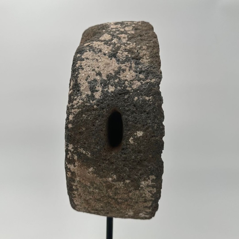 Antique Millstone Mounted as a Decorative Object on a Black Steel Stand