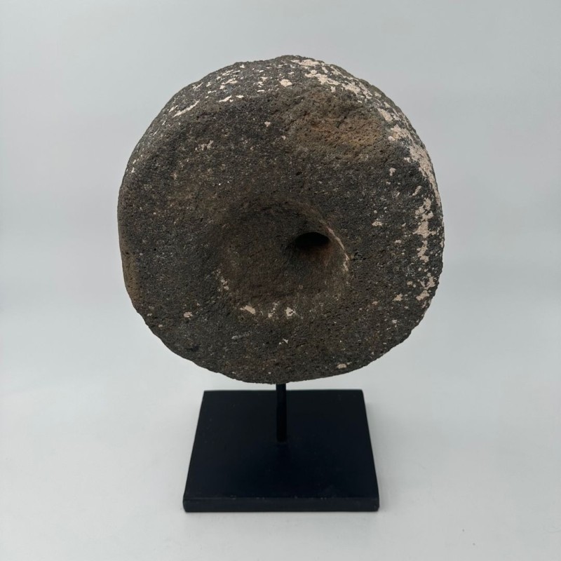 Antique Millstone Mounted as a Decorative Object on a Black Steel Stand