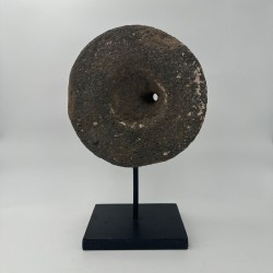 Antique Millstone Mounted as a Decorative Object on a Black Steel Stand