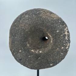 Antique Millstone Mounted as a Decorative Object on a Black Steel Stand