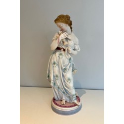 Pair of French Porcelain Figures of Women with Doves, circa 1880
