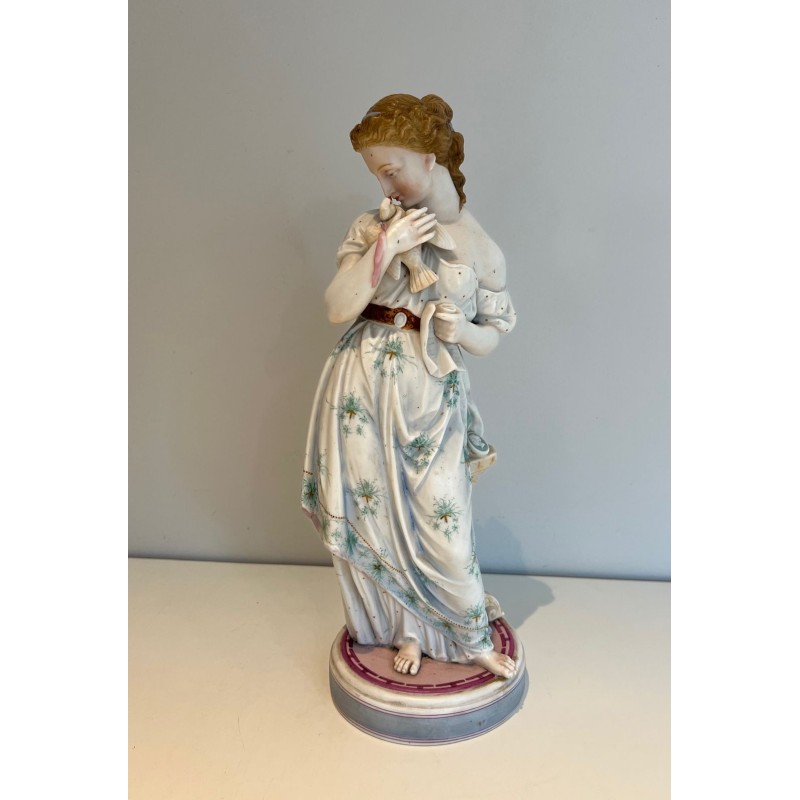 Pair of French Porcelain Figures of Women with Doves, circa 1880