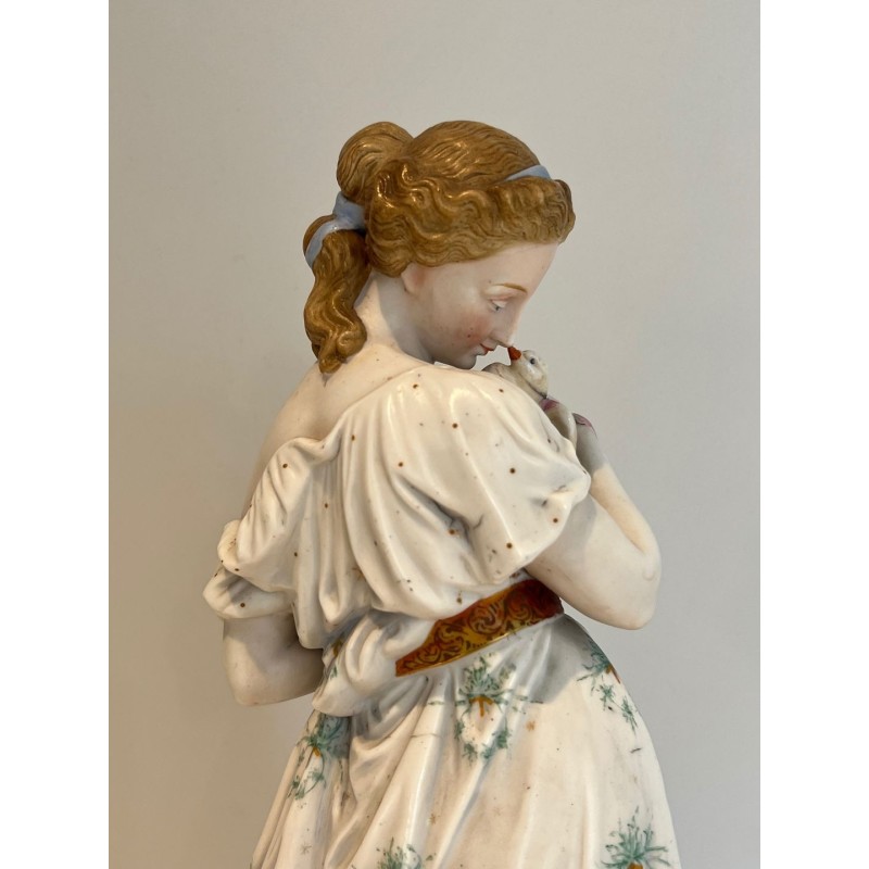 Pair of French Porcelain Figures of Women with Doves, circa 1880