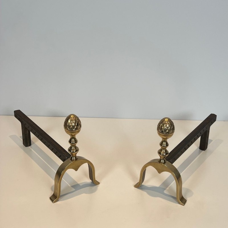 Pair of Neoclassical Brass and Iron Andirons with Pine Cone Finials, in the Style of Maison Jansen, circa 1940