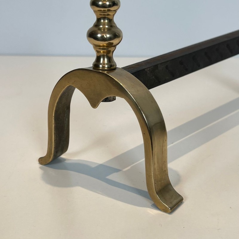 Pair of Neoclassical Brass and Iron Andirons with Pine Cone Finials, in the Style of Maison Jansen, circa 1940