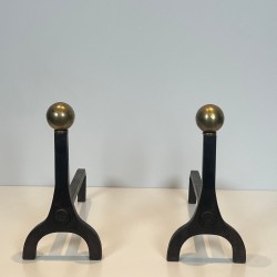 Pair of Modernist Steel and Brass Ball Finial Andirons by Jacques Adnet, French circa 1940