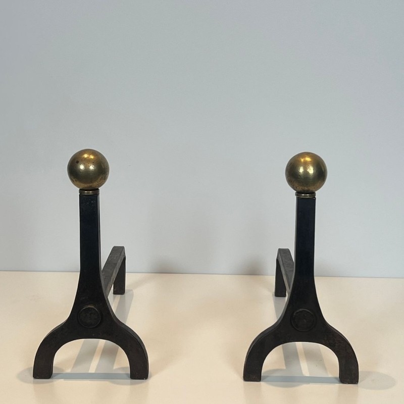 Pair of Modernist Steel and Brass Ball Finial Andirons by Jacques Adnet, French circa 1940