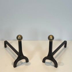 Pair of Modernist Steel and Brass Ball Finial Andirons by Jacques Adnet, French circa 1940