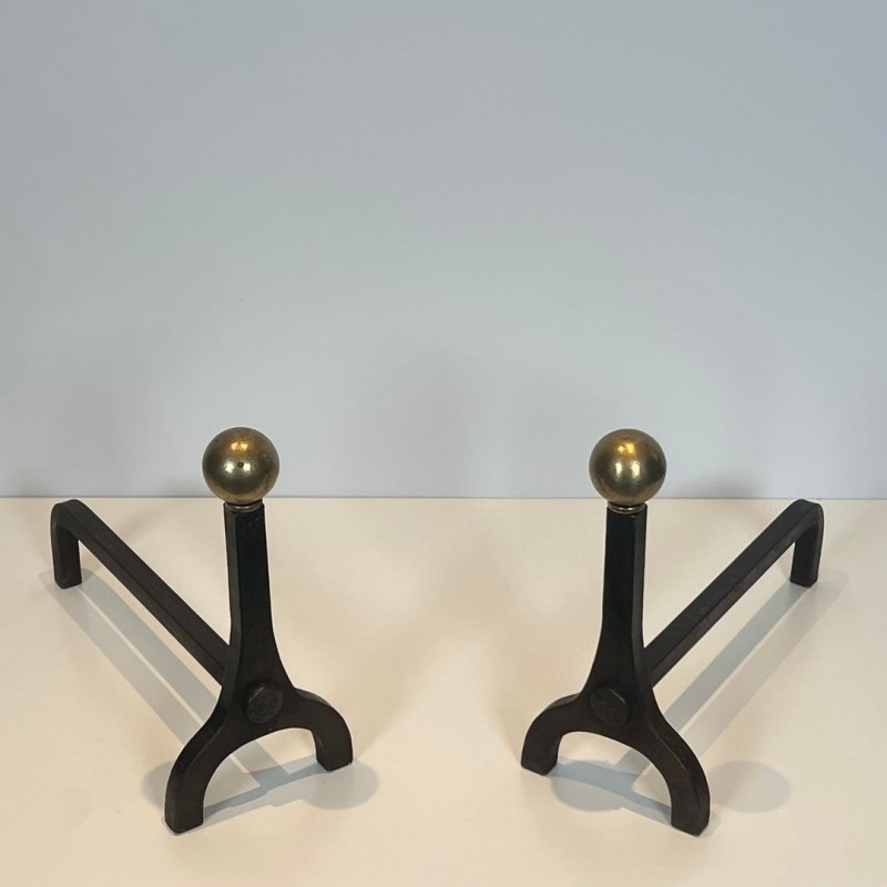 Pair of Modernist Steel and Brass Ball Finial Andirons by Jacques Adnet, French circa 1940