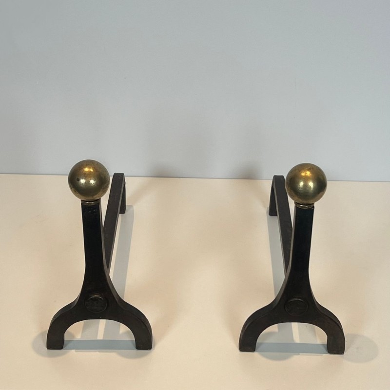 Pair of Modernist Steel and Brass Ball Finial Andirons by Jacques Adnet, French circa 1940
