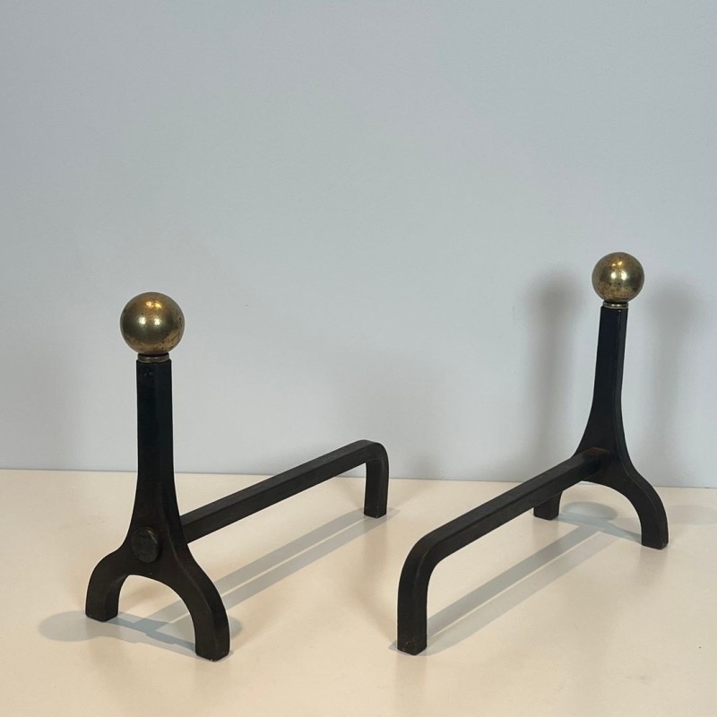 Pair of Modernist Steel and Brass Ball Finial Andirons by Jacques Adnet, French circa 1940