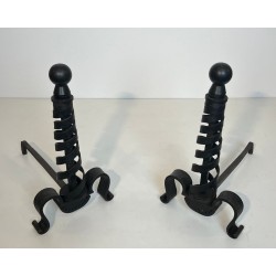 Pair of Modernist Wrought Iron Andirons with Spiral Columns and Ball Finials by Raymond Subes