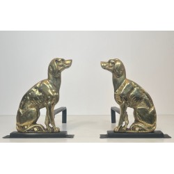 Pair of Art Déco Chiseled Bronze Sporting Dog Andirons on Black Iron Bases