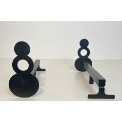 Pair of Modernist Steel Andirons with Figure-Eight Double-Disc Uprights