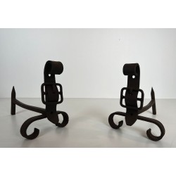 Pair of Modernist Cast Iron and Wrought Iron Belt-Buckle Andirons