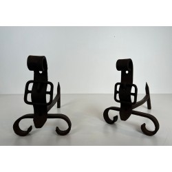 Pair of Modernist Cast Iron and Wrought Iron Belt-Buckle Andirons