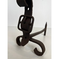 Pair of Modernist Cast Iron and Wrought Iron Belt-Buckle Andirons