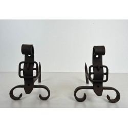 Pair of Modernist Cast Iron and Wrought Iron Belt-Buckle Andirons