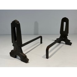 Pair of Modernist Cast Iron Andirons with Rectangular Aperture Uprights and Tripod Bases
